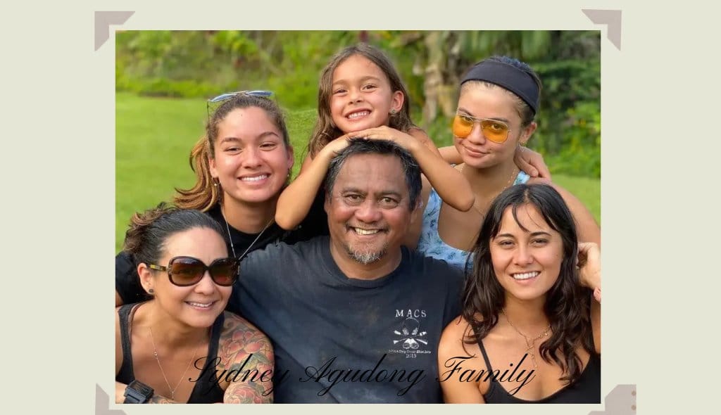 Sydney Agudong family photo with parents and sister smiling outdoors.